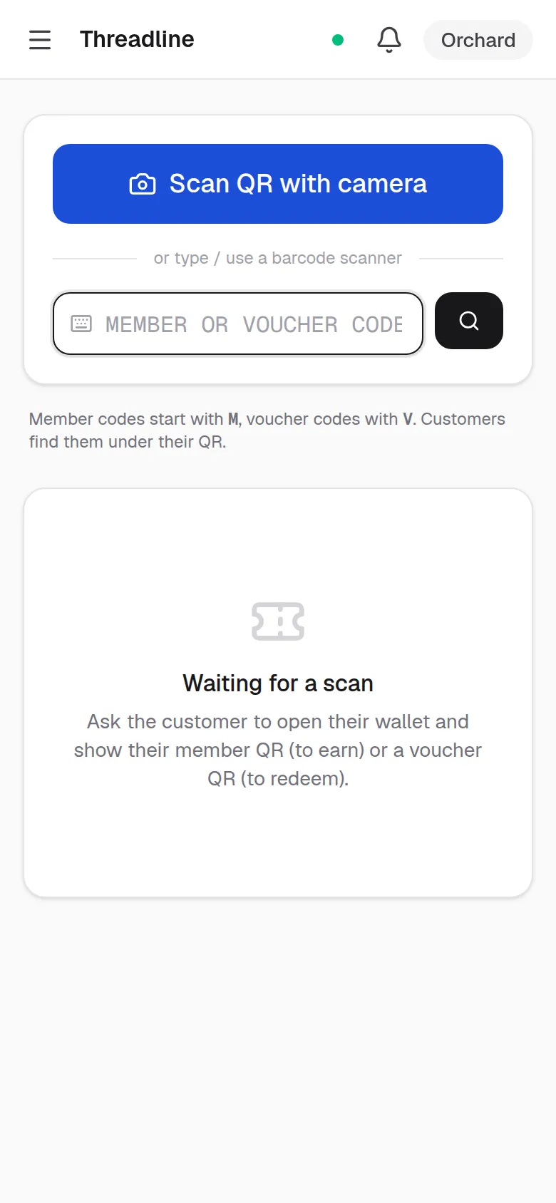 The counter on a phone: scan the member's QR, then key in what they spent to award points