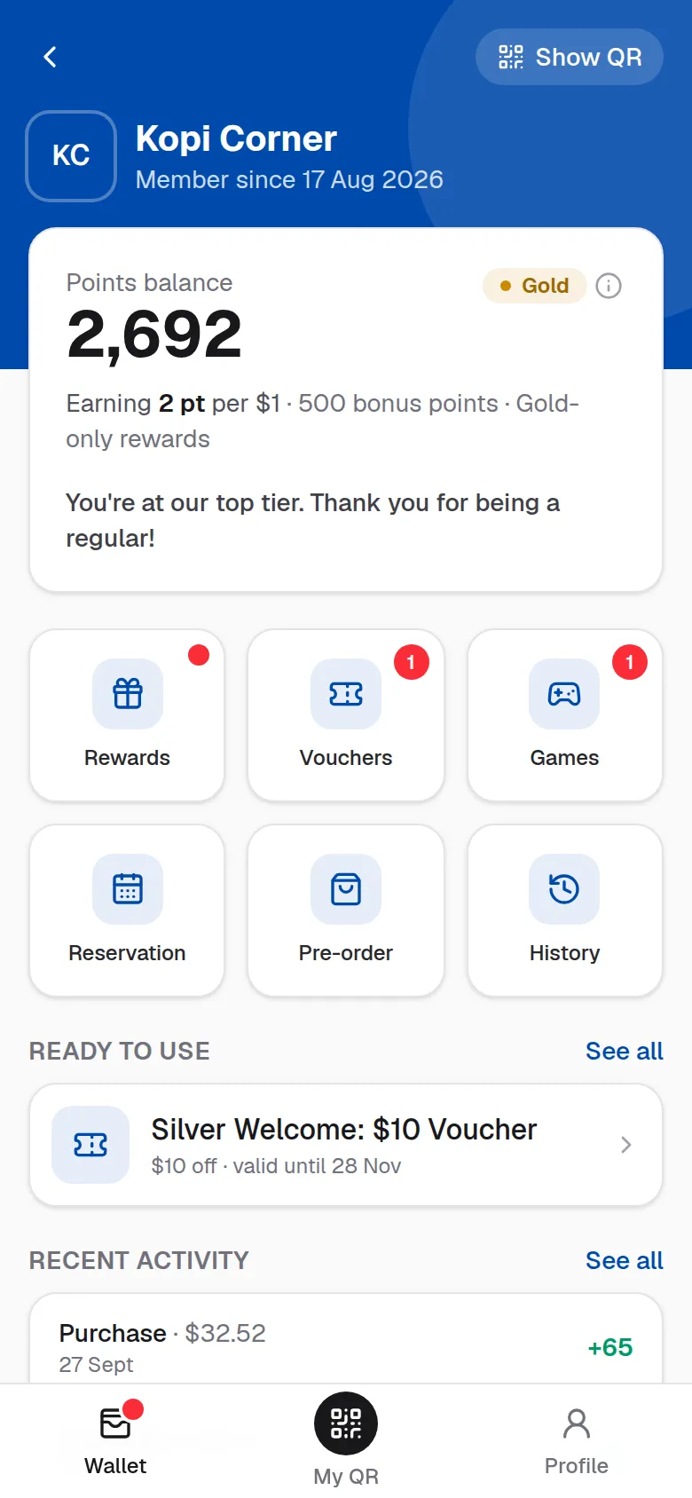 A member's wallet at Gold tier: points balance, earn rate, rewards, vouchers and games